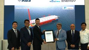 Center, left to right: Ben Ford, ABS Director, Business Development, and Ankit Garg, President Projects, SPE, hold the ABS AIP certificate. (Photo: ABS)