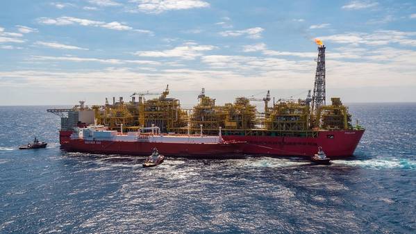 Offshore Australia: Shell’s Prelude floating liquefied natural gas (FLNG) facility delivered its first LNG cargo earlier this week. Pictured is the Prelude FLNG facility, with the Valencia Knutsen berthed side-by-side (Photo: Shell)